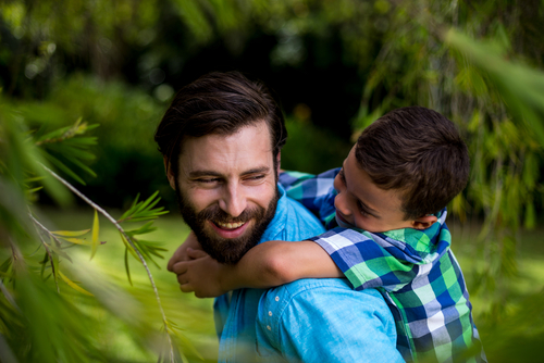 father and son enjoying the outdoors